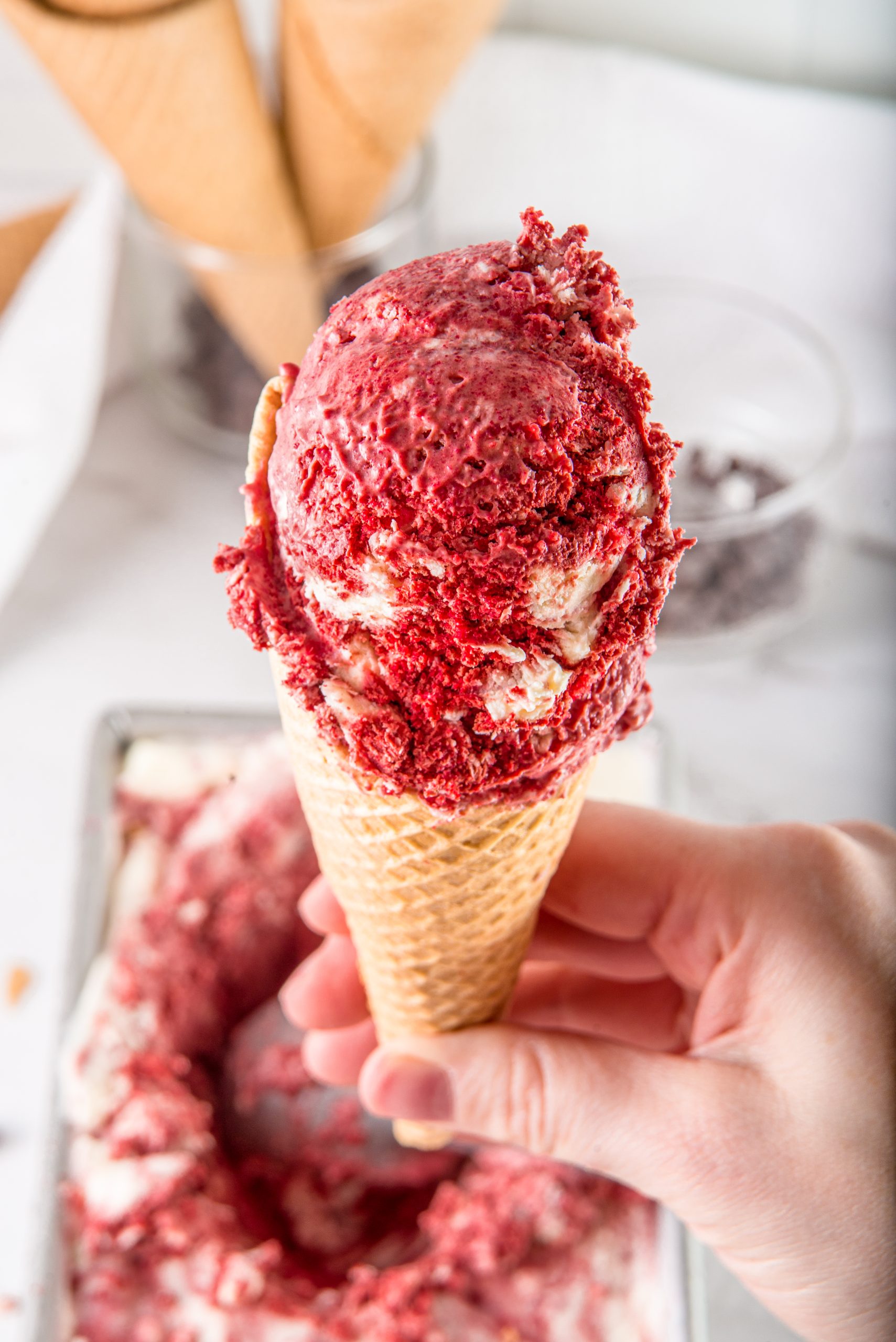 https://www.mynourishedhome.com/wp-content/uploads/2023/06/scoop-of-red_velvet-ice-cream-scaled.jpg