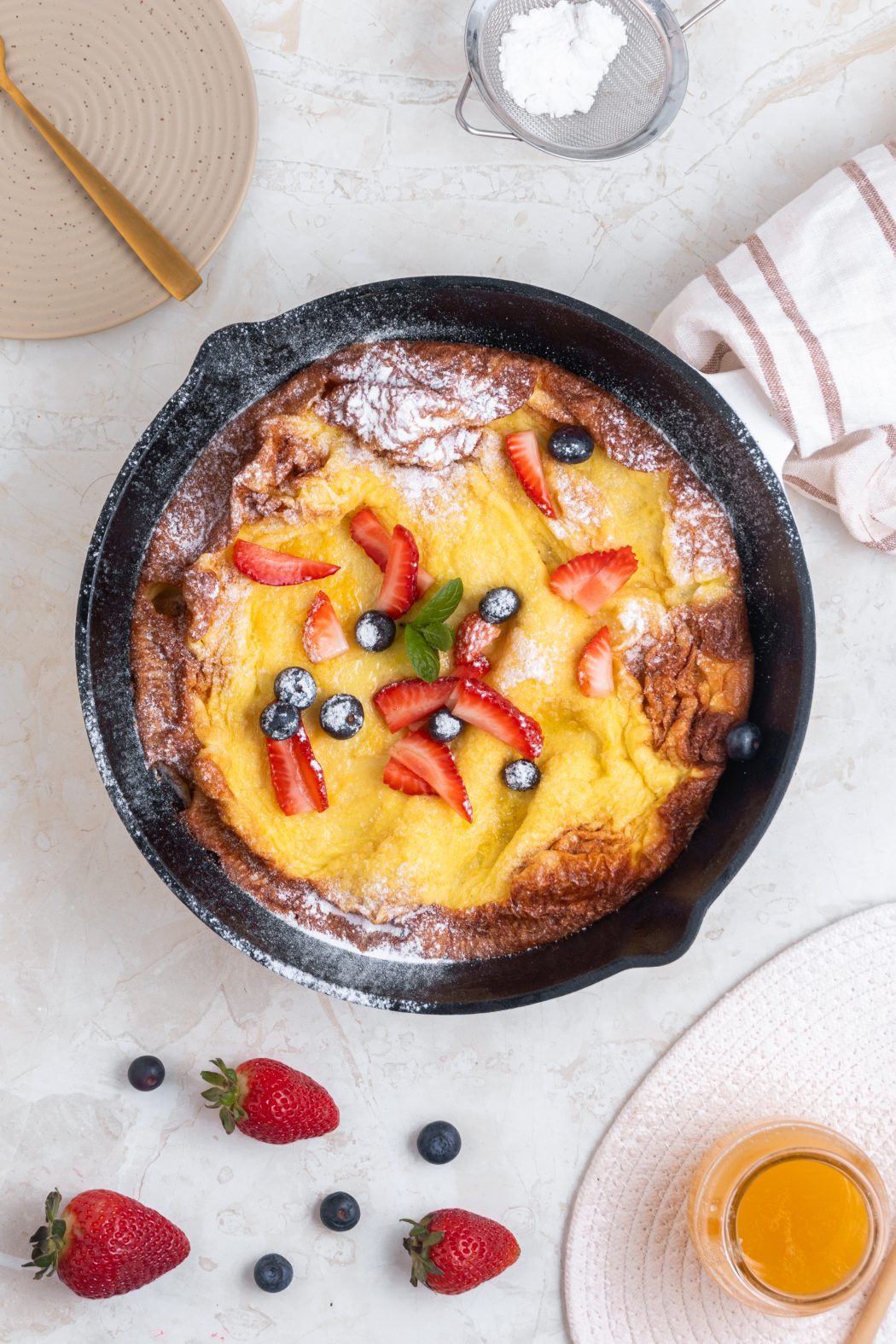 dutch baby pancake topped with fruit