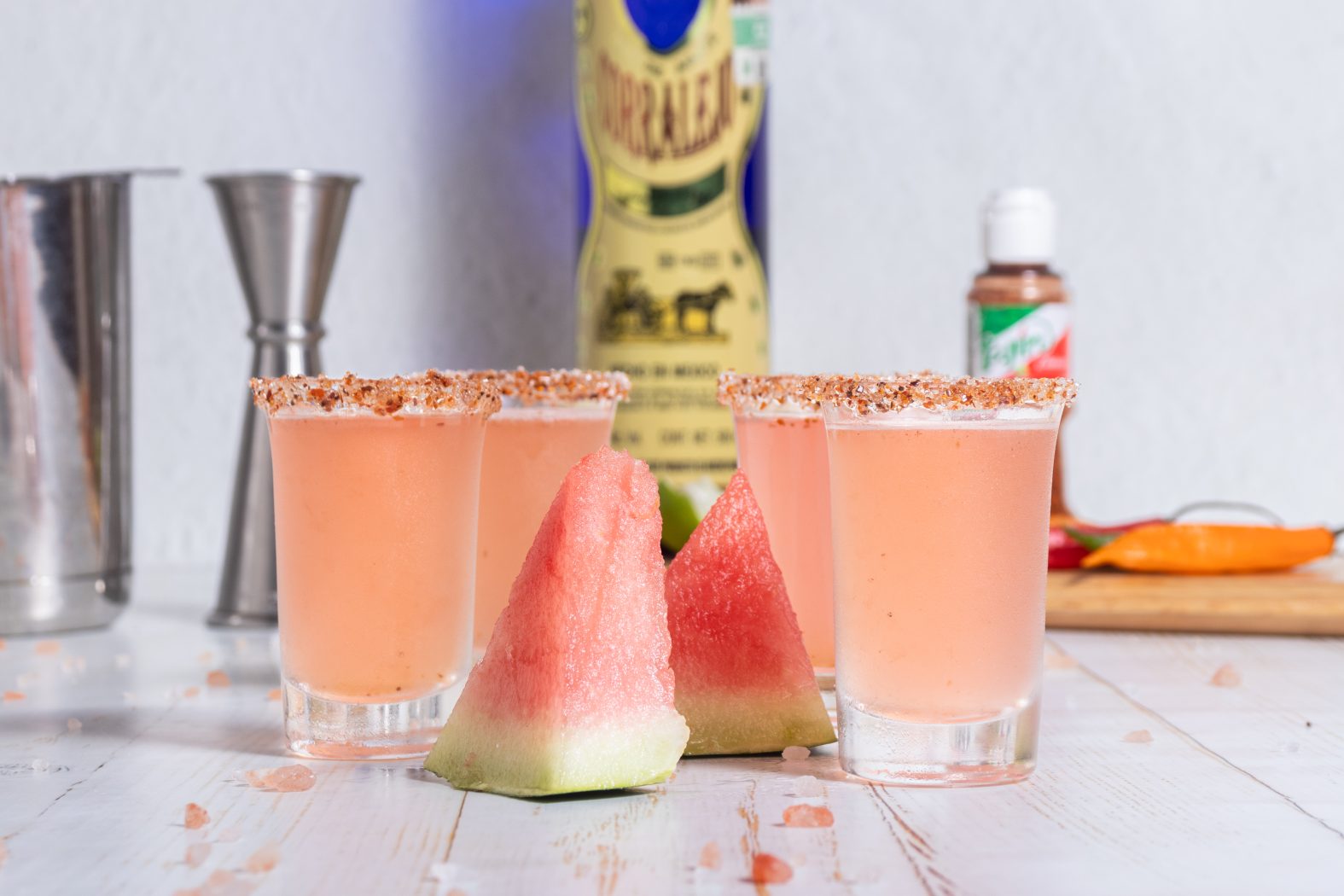 Mexican Candy shots with watermelon wedges