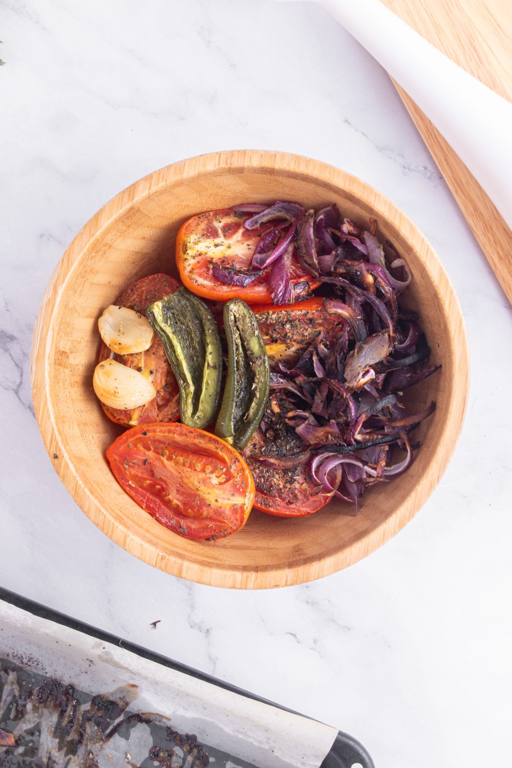 roasted tomato salsa ingredients in a bowl