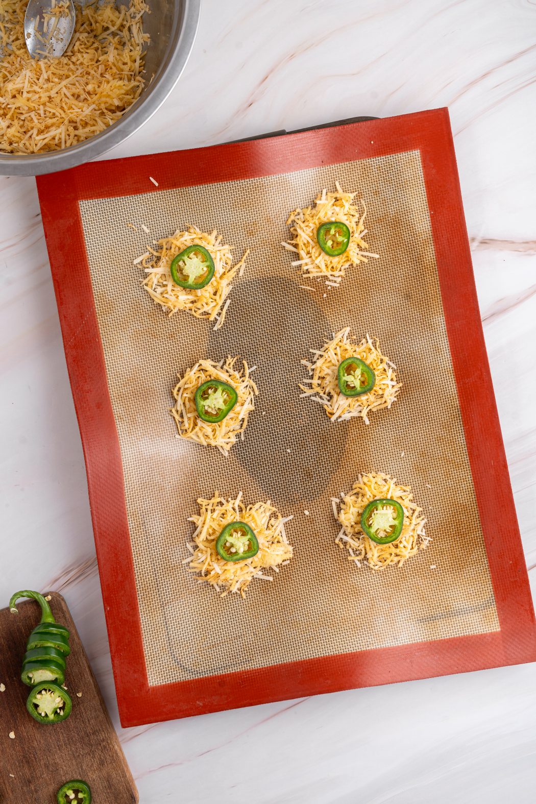 jalapeno chips on a baking mat