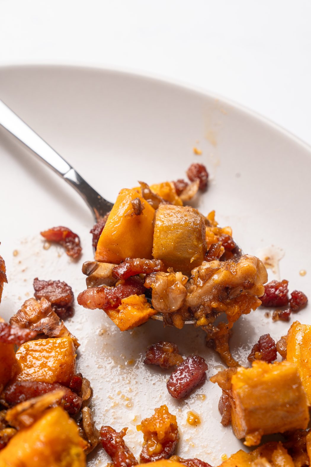 Gluten free sweet potato casserole on a spoon