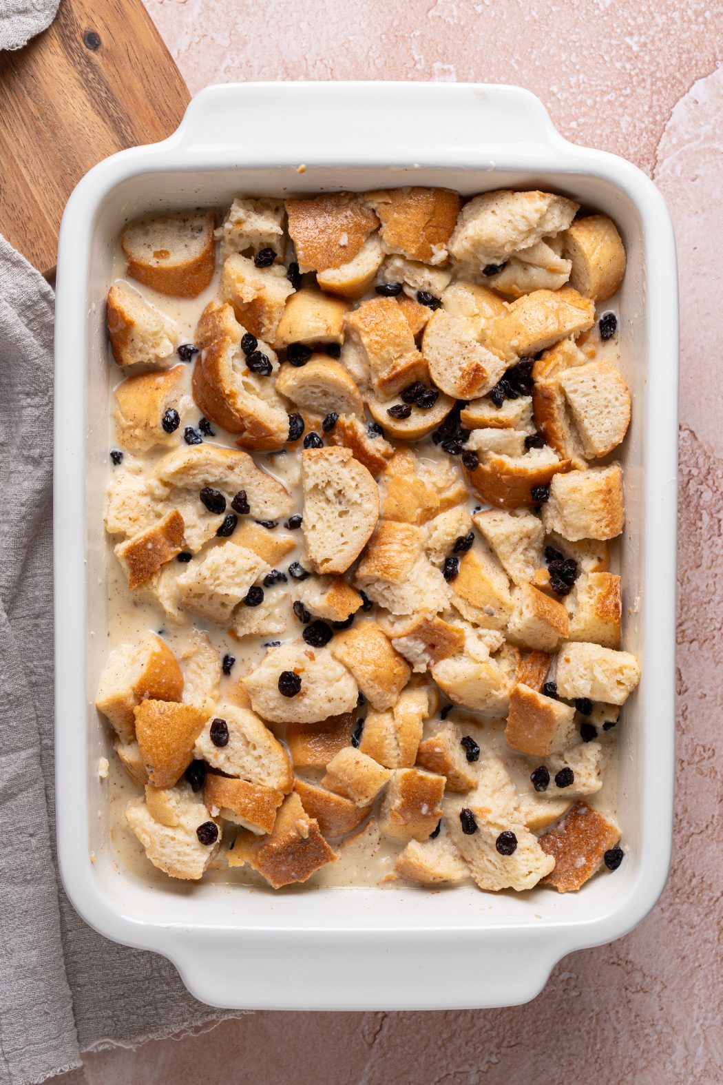 Making bread pudding in a baking dish